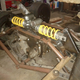 A rear suspension close-up shows how the bellcranks are used.